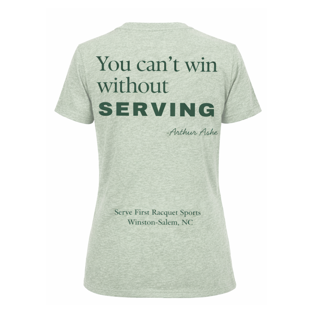 Green t-shirt with motivational quote on a white background